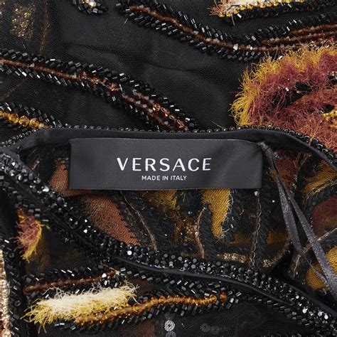 VERSACE Virtus Animalier Print Mini Dress .